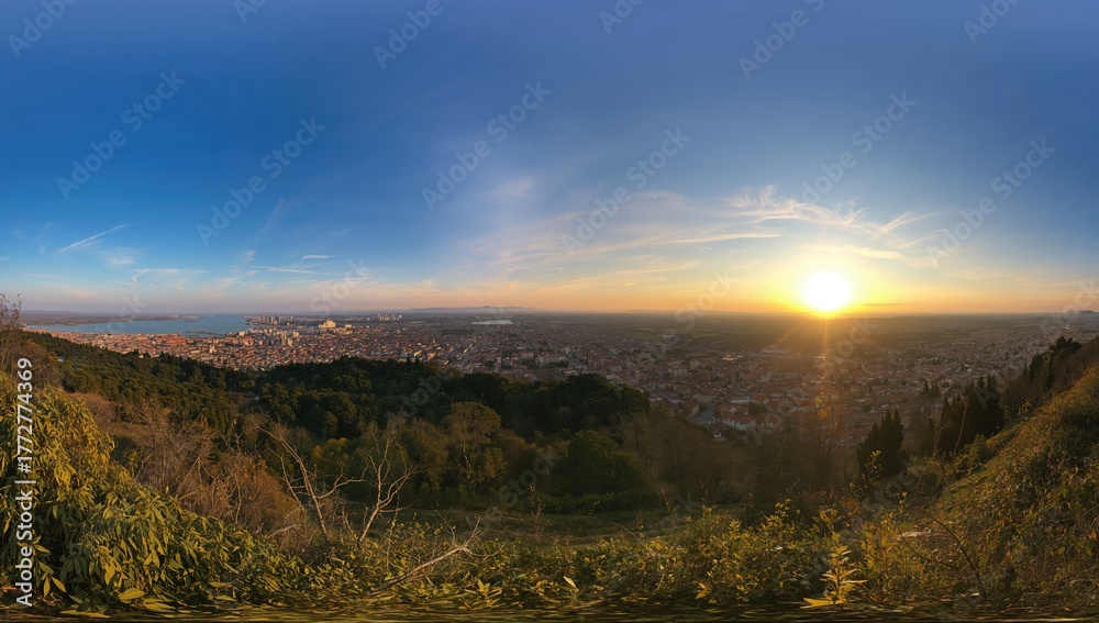 Obraz premium Wide-angle view of the sky, nature, urban landscape, sun, blue tones, and sunset