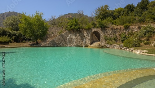 Empty natural spa with turq...