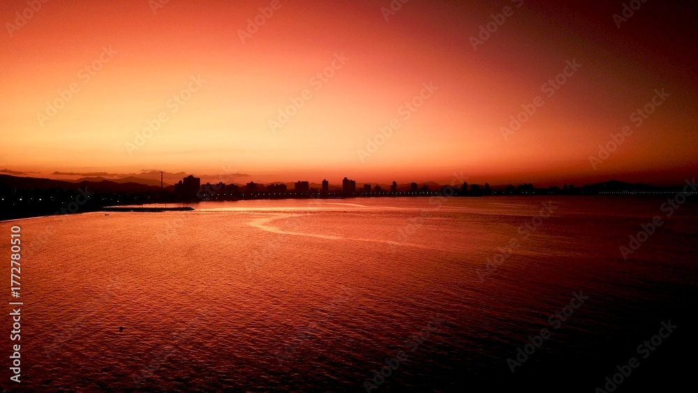 Naklejka premium Beautiful Sunset Over the Ocean Golden Hour Landscape in Brazil