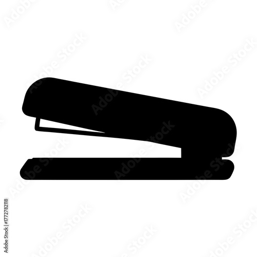 Black silhouette of a desk stapler ready to staple pages together