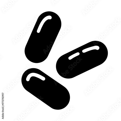 Three black capsule pills for medical treatment and health supplements isolated