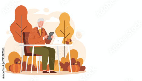 Senior professional working remotely on tablet in an autumn park setting