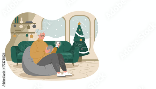 Happy senior woman using tablet and phone for online shopping in a cozy Christmasdecorated home