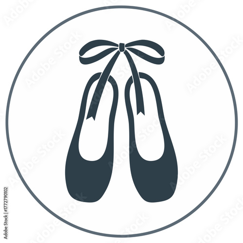 Elegant pair of classic ballet pointe shoes tied with a ribbon in a circular silhouette icon