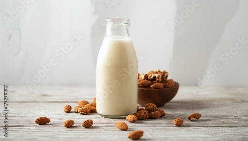 Almond milk alongside nuts ...