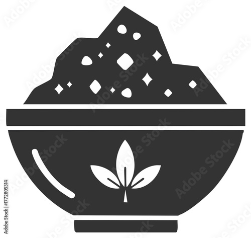 Bowl of coarse granules and sparkling elements with leaf emblem monochrome graphic