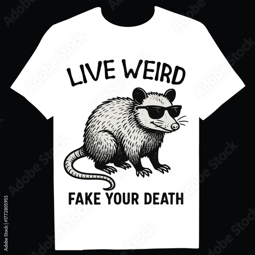 A white tshirt with a funny opossum wearing sunglasses and the words live weird fake your death