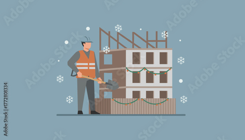 Construction worker with shovel at a winter building site decorated for the holidays