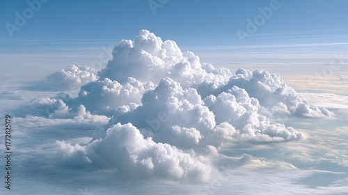 Fluffy White Cumulus Clouds Floating Above a Blue Sky during Daylight with Soft Light Creating Shadows and Highlights