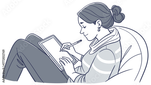 A woman drawing on a tablet while sitting on a beanbag chair in a relaxed and comfortable position at home