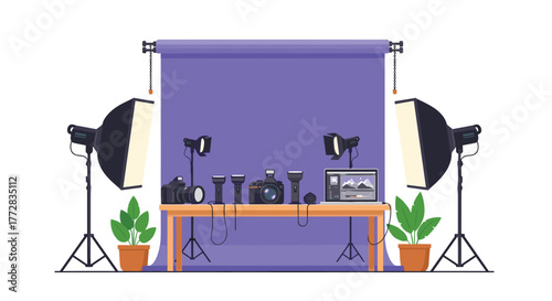 Professional photography studio setup with cameras, lighting, and laptop ready for creative projects and content creation