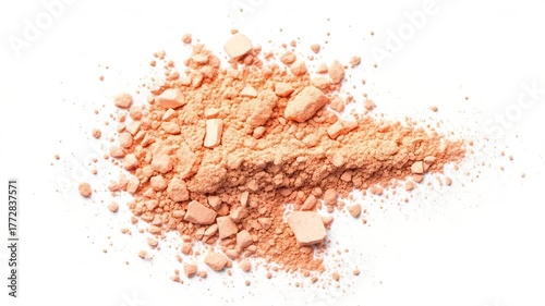 Close-up of a pile of light orange cosmetic powder on a white background.