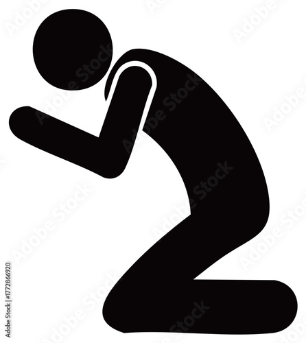 Silhouette of a person kneeling and praying