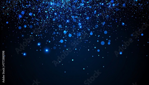 A dark blue background sprinkled with shimmering blue sparkles and glowing bokeh effects