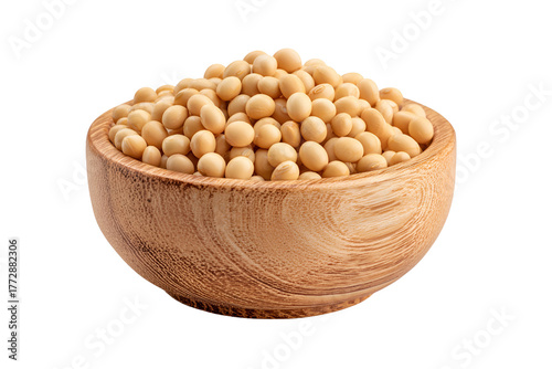 A rustic wooden bowl filled with freshly harvested soybeans against a dark background