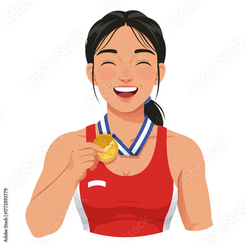 A joyful female athlete in a red top smiling proudly while holding her gold medal after a victory.
