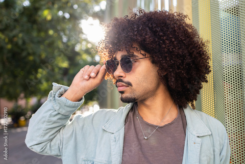 Stylish man embraces urban life with flair