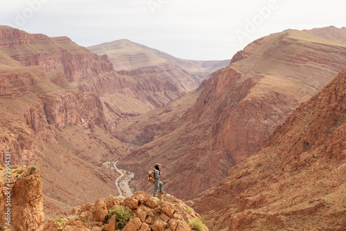 Hiker exploring dades gorges of atlas mountains in morocco