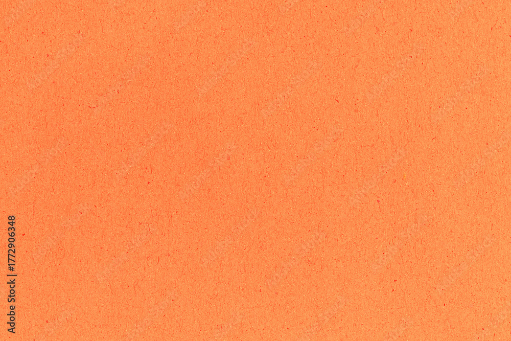 Fototapeta premium Coral orange texture of new and recycled paper with natural clean surface