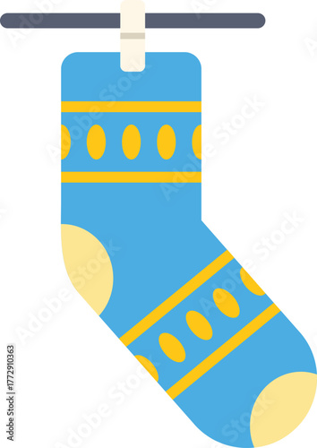 Clean blue sock hanging and drying on clothesline with clothespin after laundry