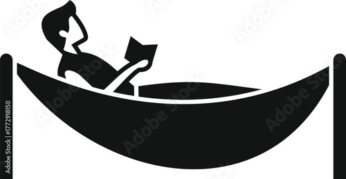Man relaxing and reading in hammock, enjoying leisure time