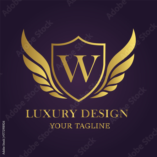Elegant golden shield with wings and letter w, representing luxury design and a tagline on a dark purple background