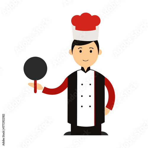 male chef holding skillet with sizzling