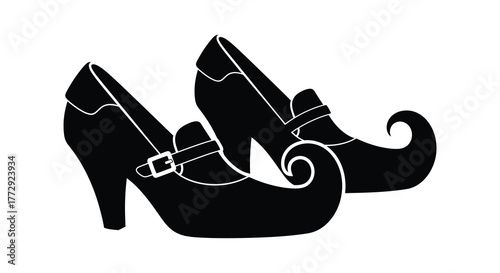 Whimsical black silhouette of two pointed toe elf shoes with buckles and high heels on a white background