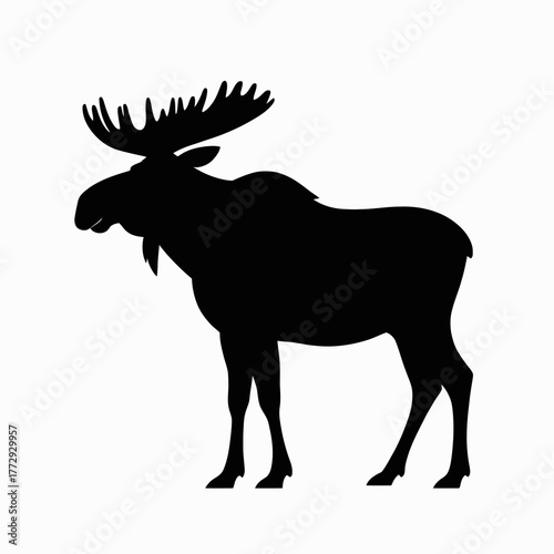 Black silhouette of a majestic bull moose with large antlers