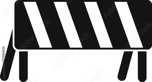 Black and white striped roadblock indicating restricted area or ongoing maintenance