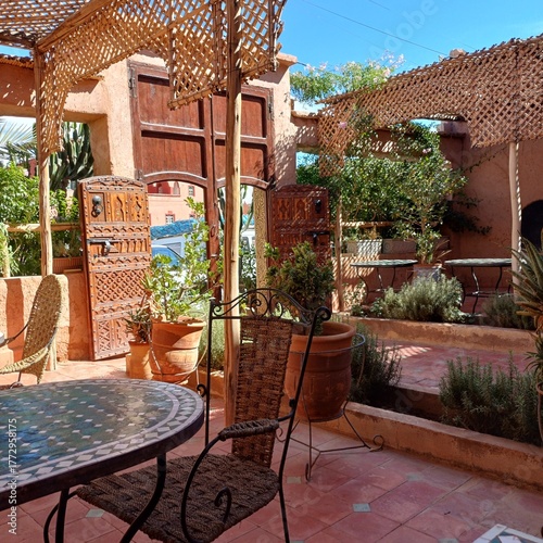 outdoor patio with tables and chairs