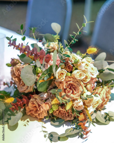 Peach bouquet with eucalyptus accents