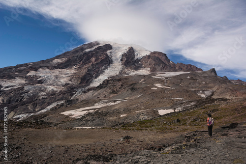 Woman looking at Mount Rainier from McClure Rock