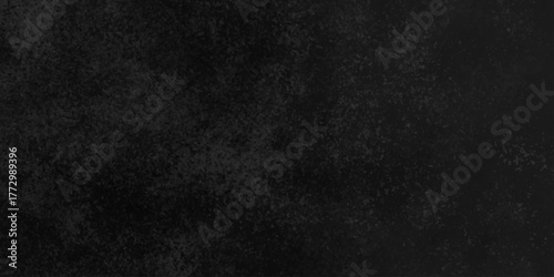 Distressed rough black cracked wall slate texture wall grunge backdrop smoke background. Stone concrete texture anthracite panorama. Old vintage charcoal night dark black stucco design.	