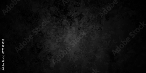 Distressed rough black cracked wall slate texture wall grunge backdrop smoke background. Stone concrete texture anthracite panorama. Old vintage charcoal night dark black stucco design.	