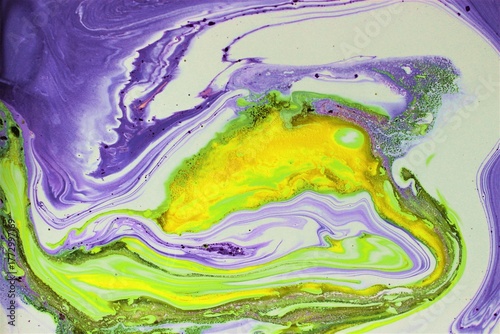 Yellow-white-lilac abstract acrylic paint background. The effect of natural stone.