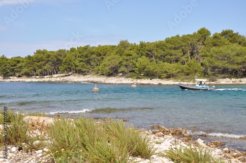 Turquoise blue water of Croatian Island Mali Losinj. Mali Losinj small entrance to the port of the city through sea