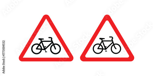 Two identical triangular red warning signs with a black bicycle symbol indicating a bicycle crossing or route ahead