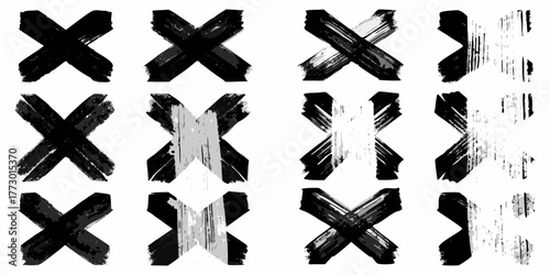 Collection of twelve diverse black and white abstract brush stroke x marks on a white background