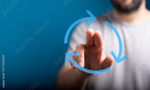Close-up of a man's hand in...