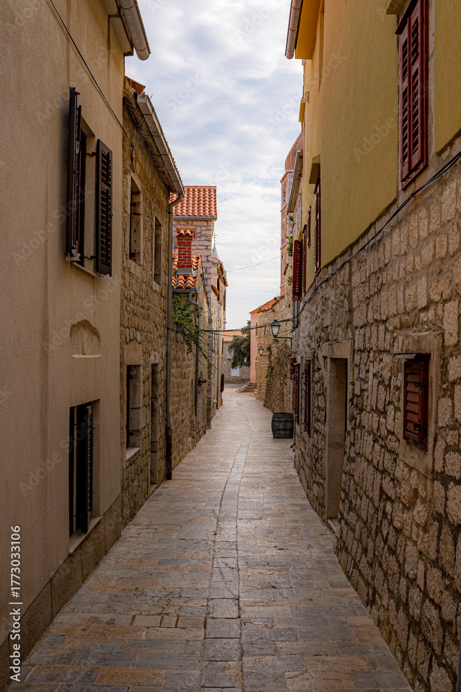 Obraz premium narrow street in the old town of Rab, Croatia, Mediterranean, without people
