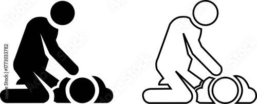 Two figures performing cpr chest compressions silhouette