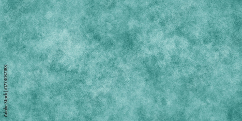 Abstract Elegant dark green background with mottled vintage texture in old fancy background design, texture of colored parchment paper.	
