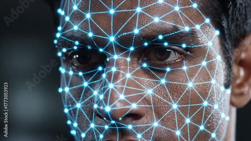 Close-up of a man's face with digital facial recognition technology overlay, showcasing data points