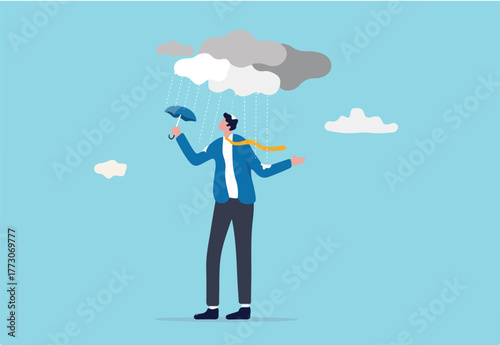 Wrong decision or business mistake causing failure, risk management or unlucky problem and trouble concept, soaked misfortune businessman with too small umbrella protection in strong raining storm.