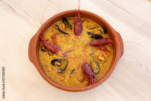 Traditional spanish rice dish with red prawns and mussels