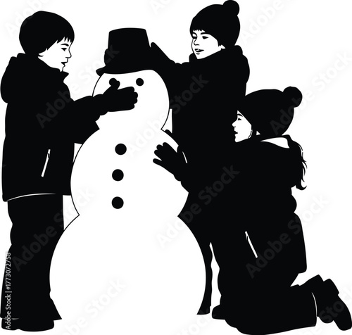 Children are building a snowman together, putting a hat its head winter fun and seasonal activity