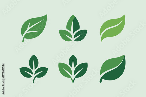 A collection of six stylized green leaves on a light green background.