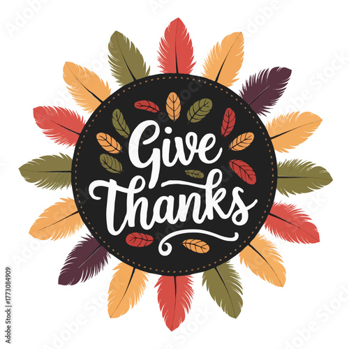Decorative circular arrangement of colorful autumn feathers surrounding a central black circle with the handwritten phrase give thanks in white lettering isolated on white background