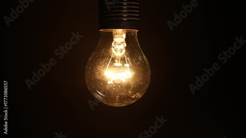 Light bulb flickering. Unstable voltage. Power outages